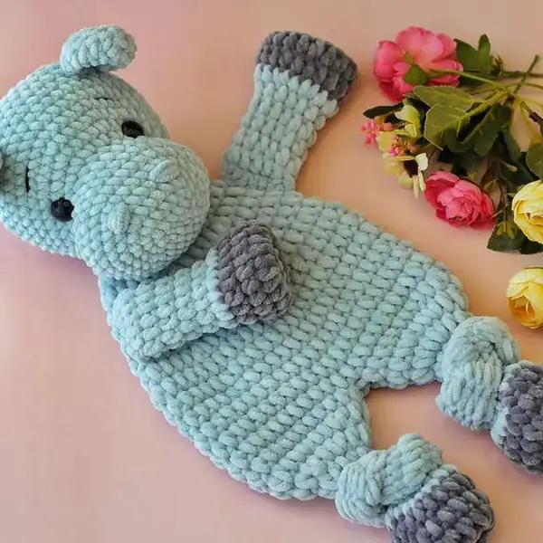 Arms and feet detail showing dark gray paw tips on hippo lovey amigurumi