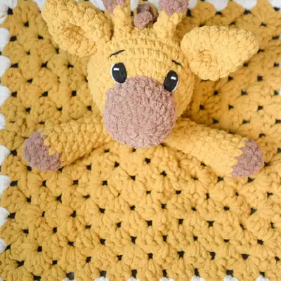 Close-up of giraffe head crochet amigurumi