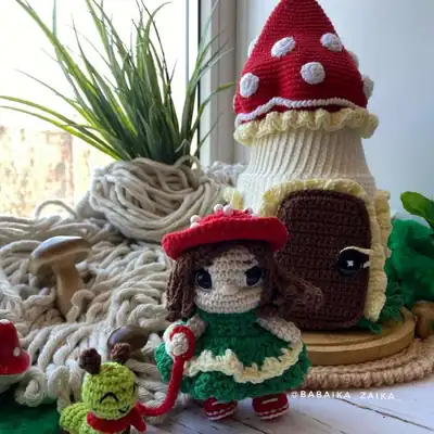 Amanita House amigurumi mushroom house with doll nearby