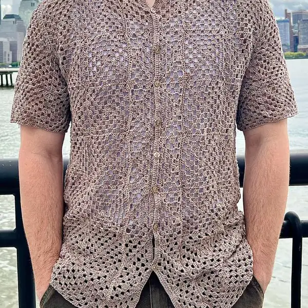 Close-up of crochet square motifs and collar detail on the Amalfi top highlighting lacy double crochet clusters