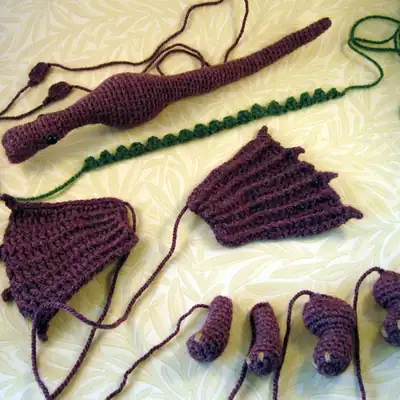 Purple dragon amigurumi head closeup