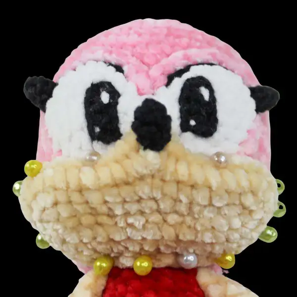 Embroidered eye details on Pink Rascal