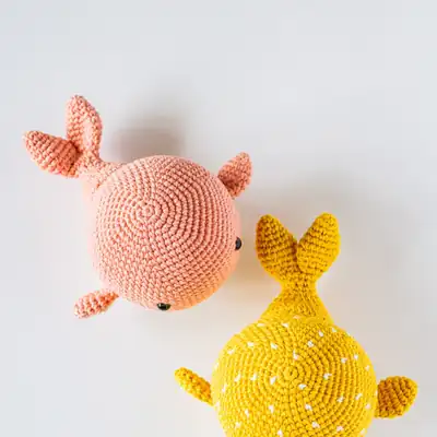 Pink Wallace whale amigurumi side view
