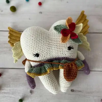 Tooth Fairy amigurumi front view with flower crown