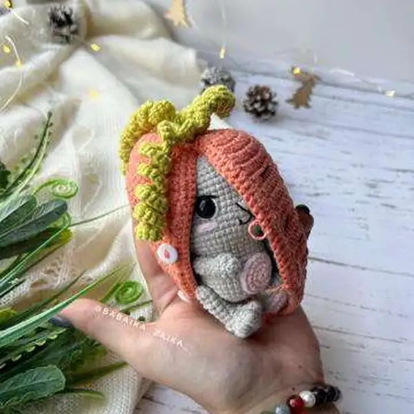 Finished Bunny-Carrot amigurumi on a surface