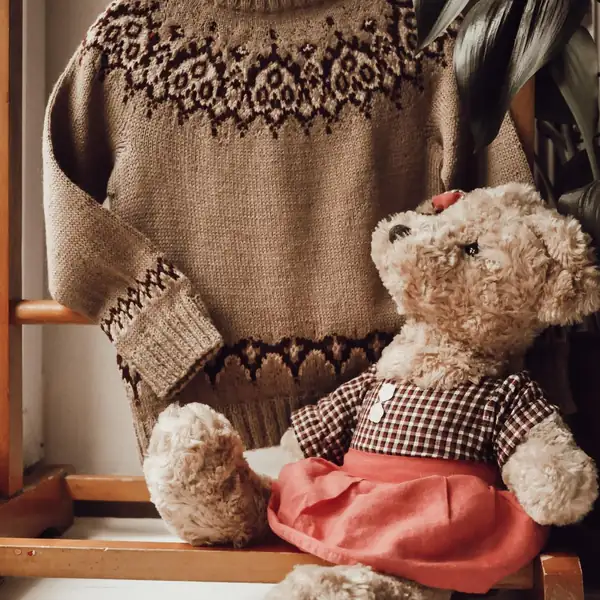 Close-up of colorwork yoke pattern on Guell Girls sweater