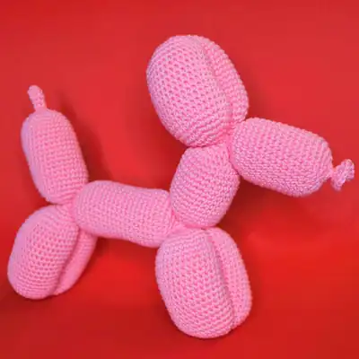 Pink balloon dog amigurumi in progress