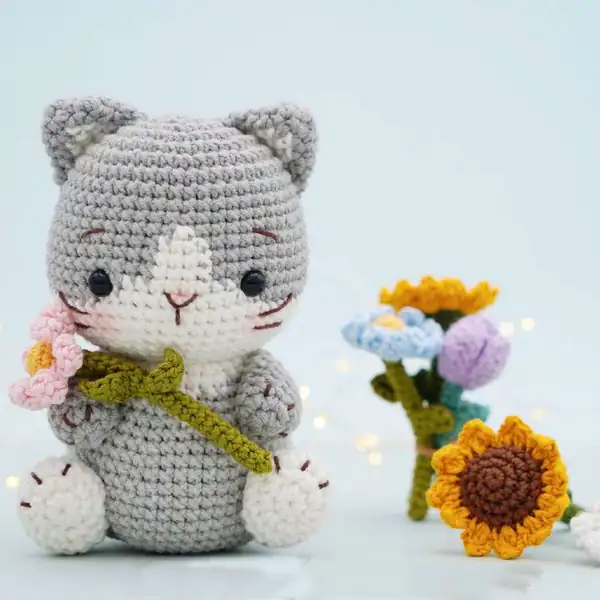 Bright yellow sunflower amigurumi with petals
