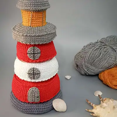 Light grey lighthouse base with stacked rings in progress