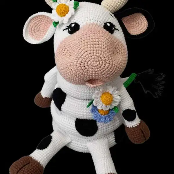 Finished cow stacking toy with flowers and ring tower