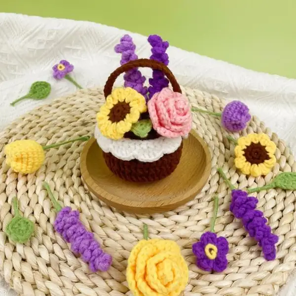 Assorted crocheted flowers including forget-me-nots and tulips
