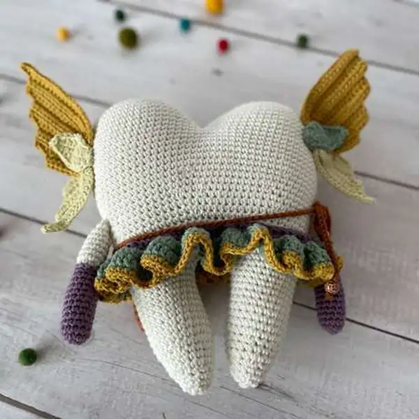 Face close-up with embroidered eyelashes