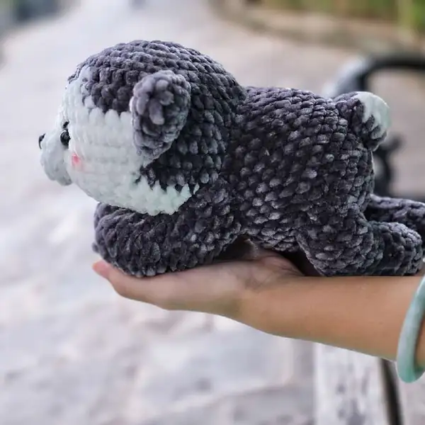 Husky amigurumi tail being attached