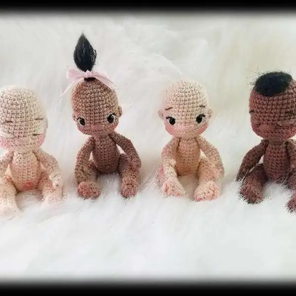 Finished baby doll with tiny accessories