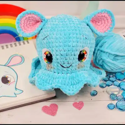 Blue Dumbo Octopus amigurumi front view in blue yarn