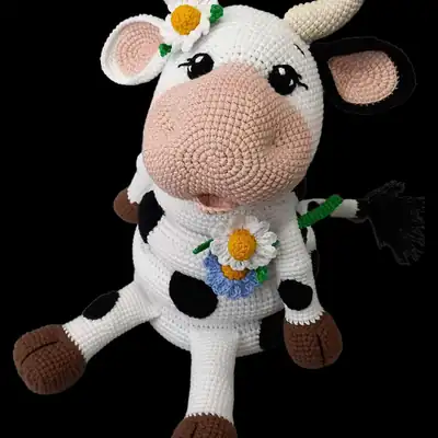 Close-up of the cow amigurumi head with horns